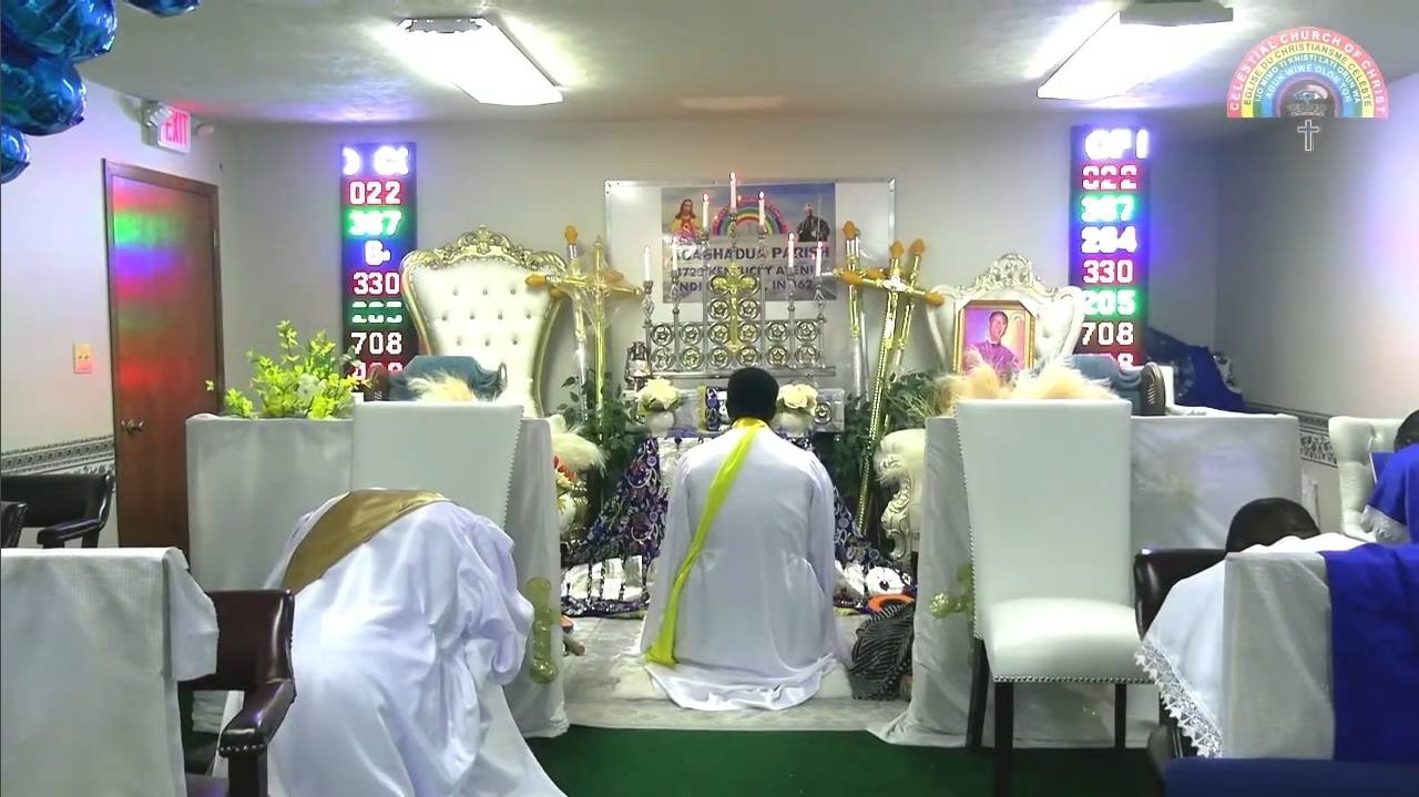 Worshipers gathered before the altar inside the Agashadua Parish sanctuary